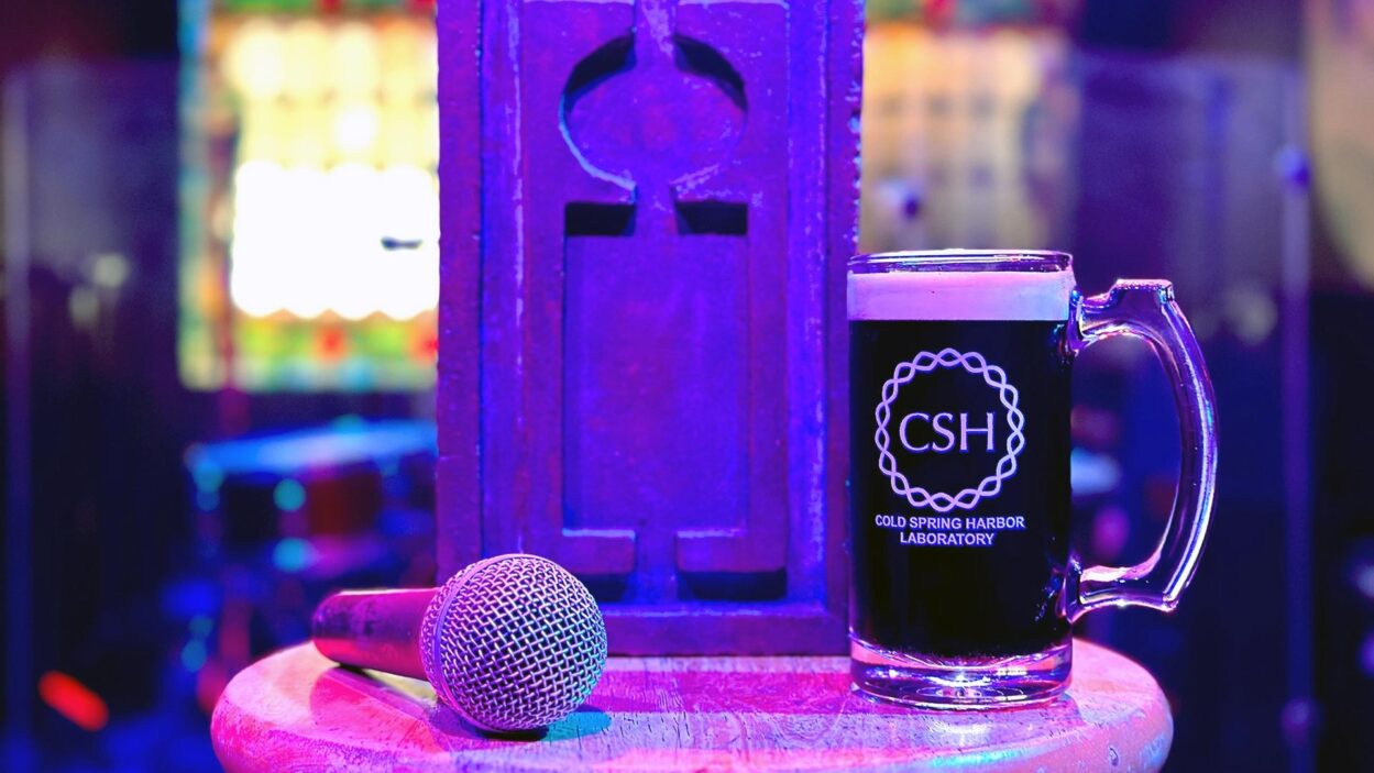 image of a microphone, a CSHL mug, and an Industry Makers logo on a bar stool